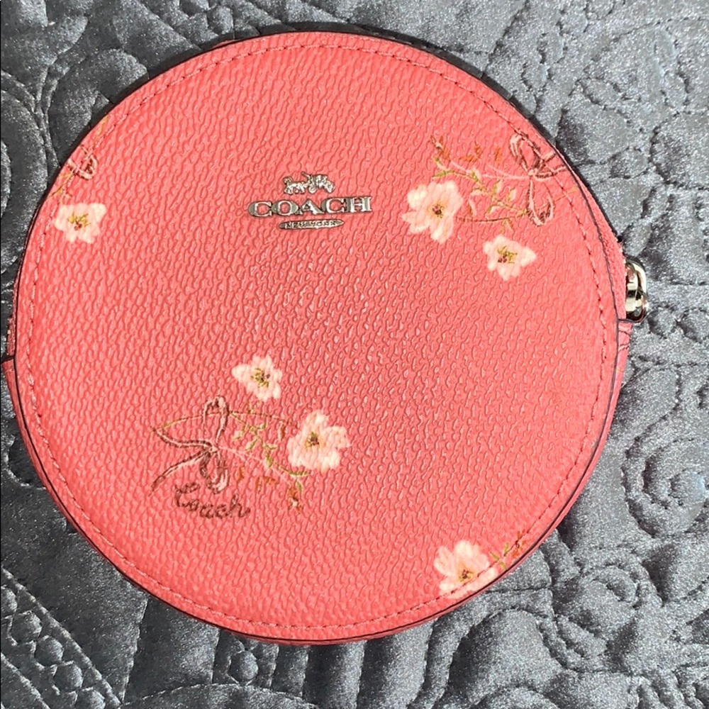 Coach Authentic Beechwood floral change purse.